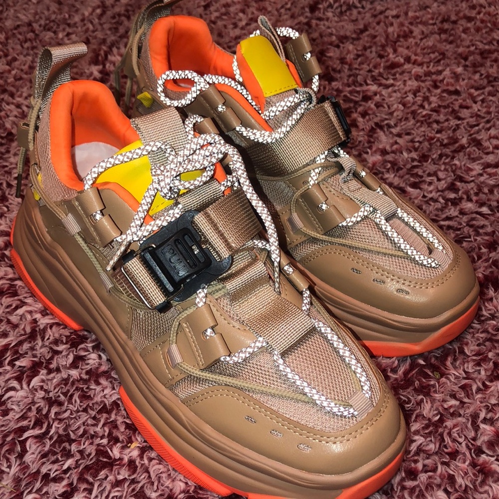 Gold and orange sneakers